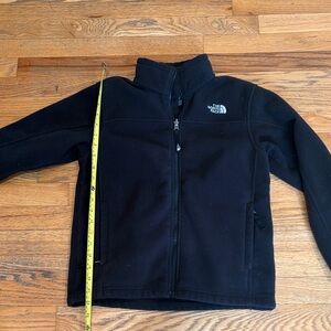 The north face black zip up fleece size 10/12 excellent condition